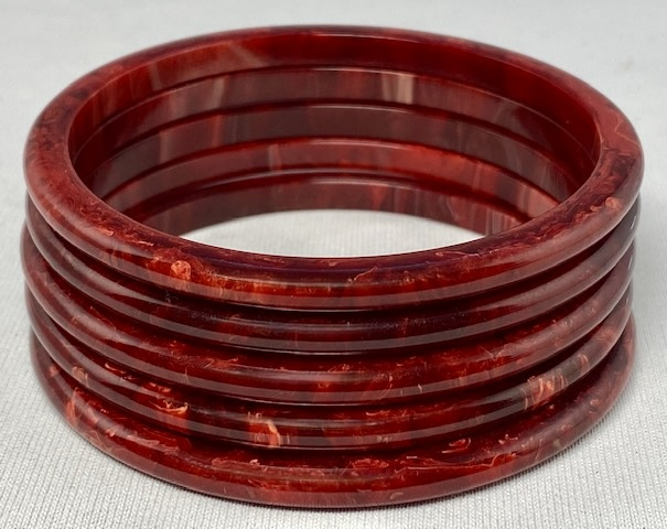 BS50 set 5 rounded black cherry bakelite spacers